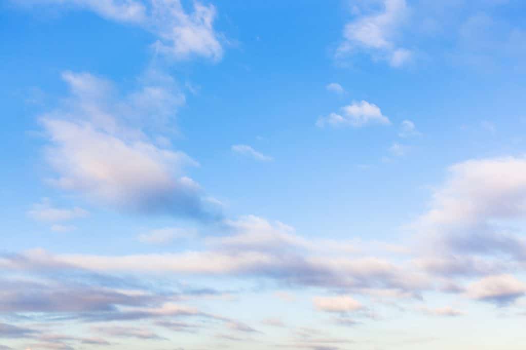 low clouds in blue sky in evening twilight