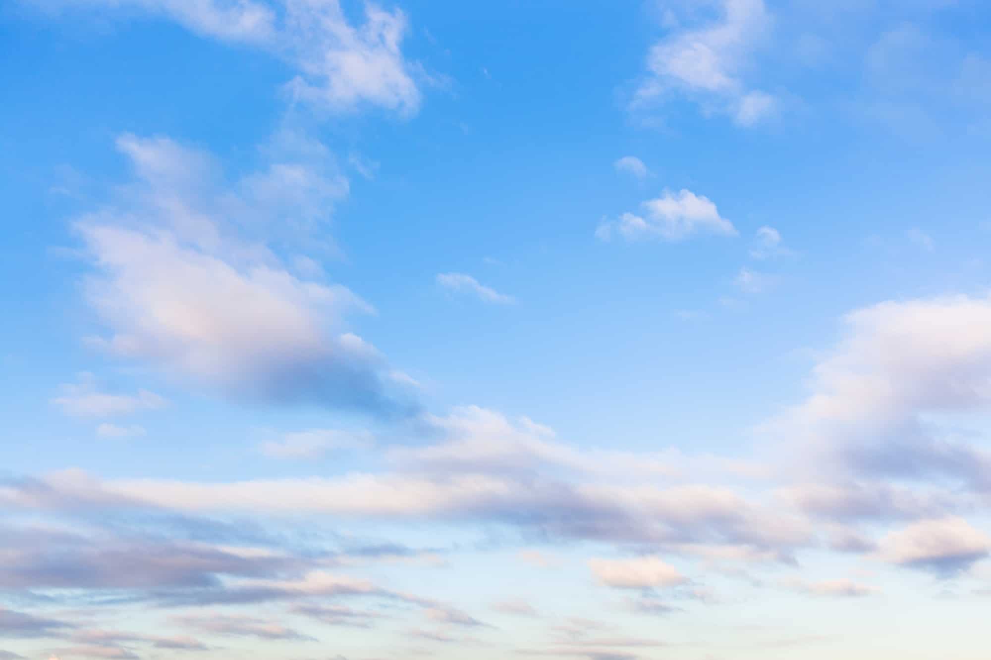 low clouds in blue sky in evening twilight